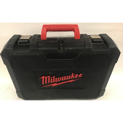 20 - Milwaukee hammer drill with charger and battery in carry case.