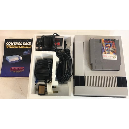 24 - Nintendo boxed entertainment system (NES version).