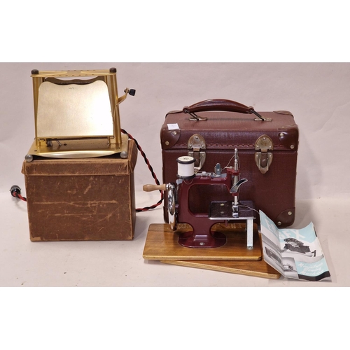 169 - Essex Miniature sewing machine cased with instructions together a 