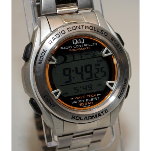 385 - Q&Q Radio Controlled Solarmate gents multi-function digital watch. Good condition and seen working a... 