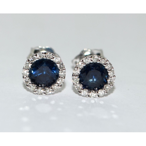 477 - 18ct white gold Diamond and sapphire round halo earrings