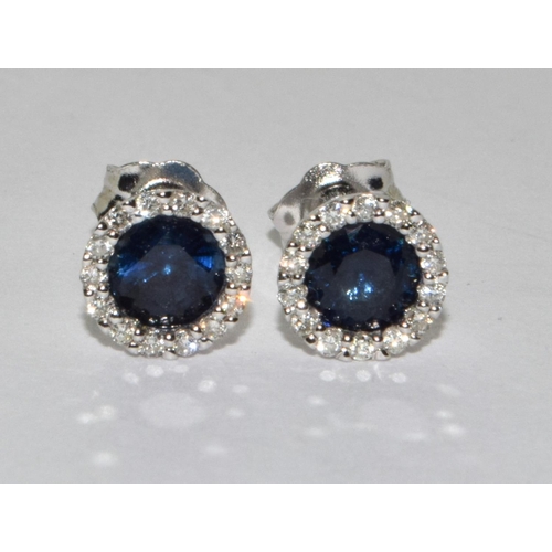 477 - 18ct white gold Diamond and sapphire round halo earrings