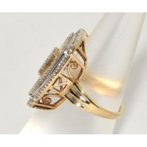 435 - Diamond round and baguette cut set in 5.8g of white and yellow gold ring Size M