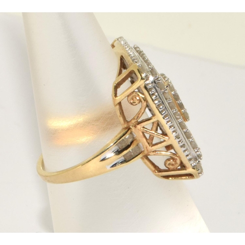 435 - Diamond round and baguette cut set in 5.8g of white and yellow gold ring Size M