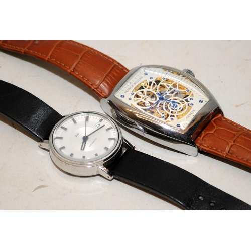 255 - Two gents automatic fashion watches. Seen working at time of listing.