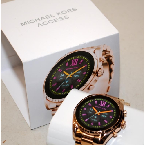 247 - Michael Kors Access Bradshaw rose gold plated smart watch. Unused and boxed