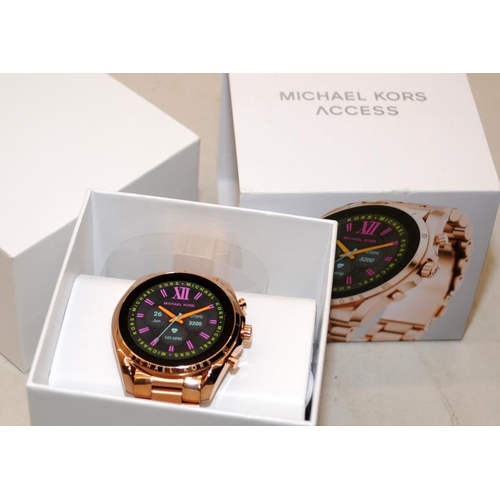 247 - Michael Kors Access Bradshaw rose gold plated smart watch. Unused and boxed