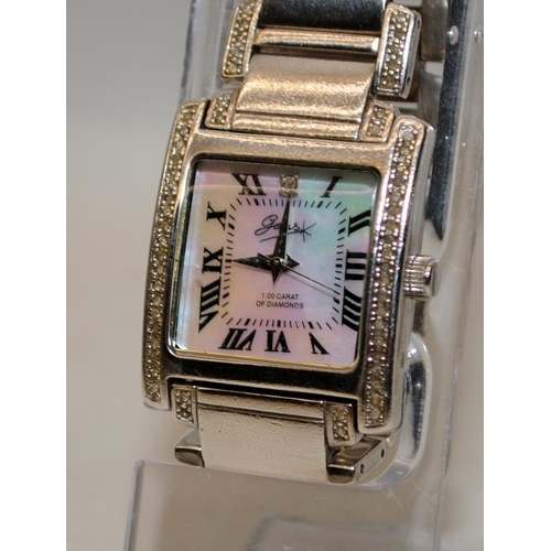 359 - 925 silver unisex Diamond set watch marked as 1ct. With spare links, requires new battery fitting