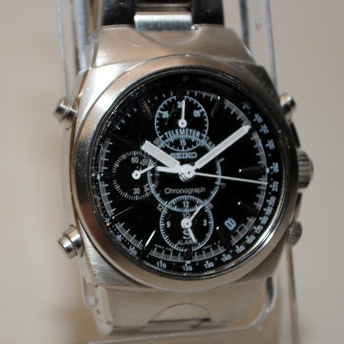 412 - Seiko gents quartz chronograph 7T32-9000. Seen working at time of listing