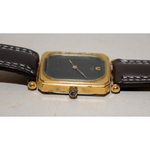 413 - Vintage Ungaro Paris gents manual wind dress watch. Seen working at time of listing. 31mm across inc... 