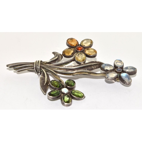 299 - 925 silver flower brooch set with Peridot, Moonstone and Citron