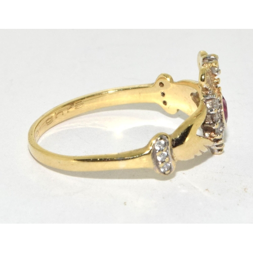 313 - 9ct gold ladies Diamond and ruby hands of friendship ring size L/M