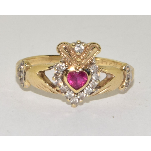 313 - 9ct gold ladies Diamond and ruby hands of friendship ring size L/M