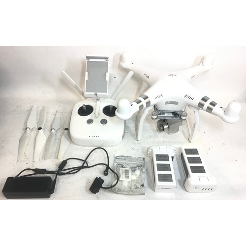 84 - DJI Phantom W322B Advanced Drone including 2 Batteries - charger - hand held unit -  4 x propellers ... 