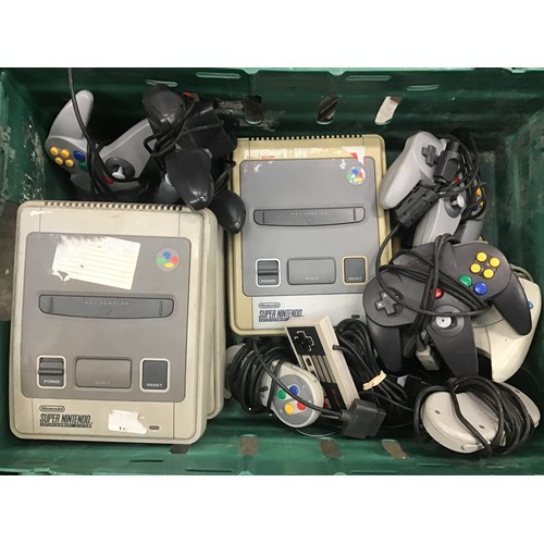 89 - Box of 3 Super Nintendo game entertainment systems along with various hand held controllers.