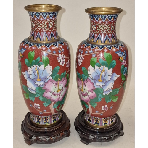 199 - Pair of Cloisonne vases standing on wooden bases 26cm tall