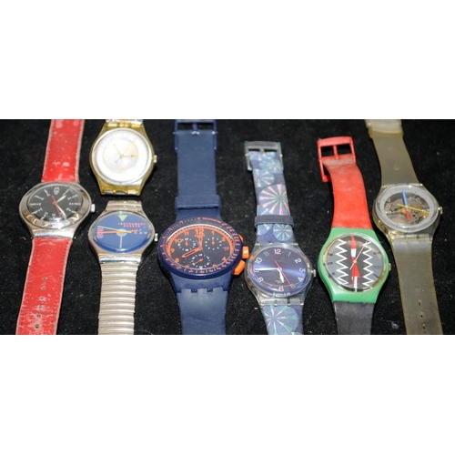 338 - A small collection of vintage Swatch Watches. 7 in lot