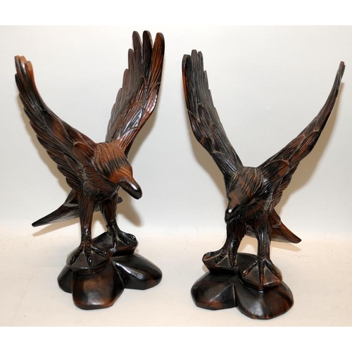 129 - Pair of decorative wooden eagles / birds of prey 12.5