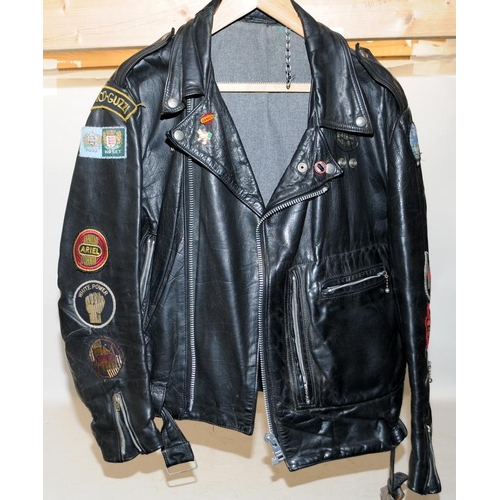 118 - Lewis leather motorbike jacket and badges. 27