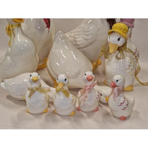 166 - Collection of porcelain Duck family models all signed  to base 