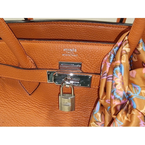 115 - Ladies Hand bag with lock and key appears unused