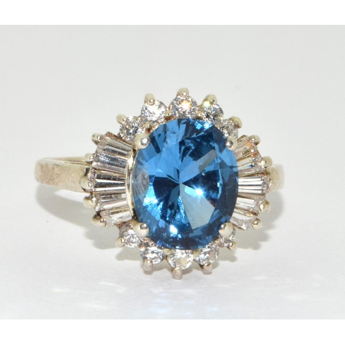 210 - A stunning CZ and blue topaz 925 silver ring Size S