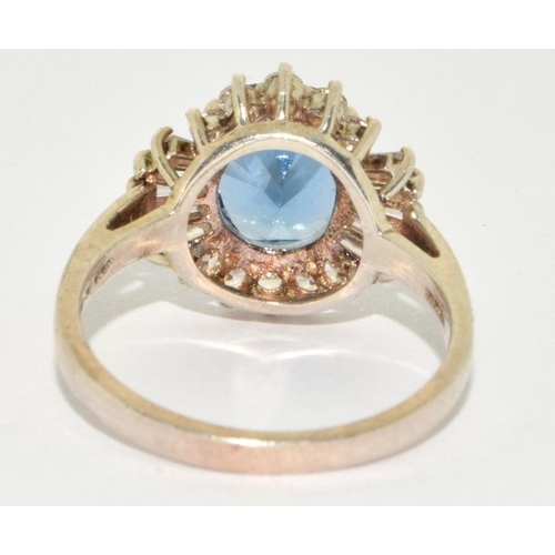 210 - A stunning CZ and blue topaz 925 silver ring Size S