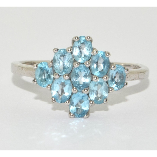 282 - A 925 silver and aquamarine cluster ring Size R