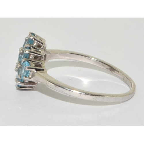 282 - A 925 silver and aquamarine cluster ring Size R