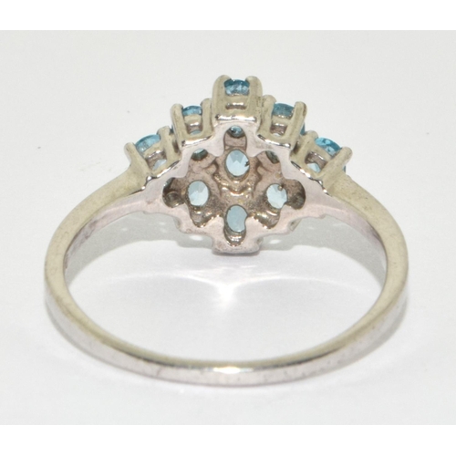 282 - A 925 silver and aquamarine cluster ring Size R