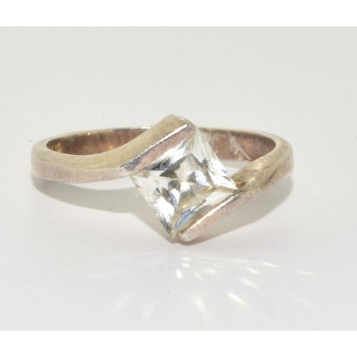 234 - A 925 silver square solitaire, Size N.