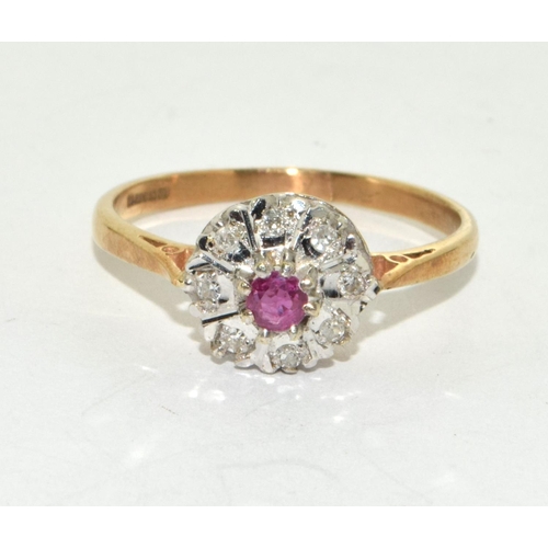 241 - 9ct gold ladies diamond and Ruby ring size Q