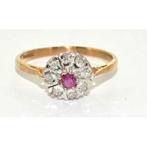 241 - 9ct gold ladies diamond and Ruby ring size Q