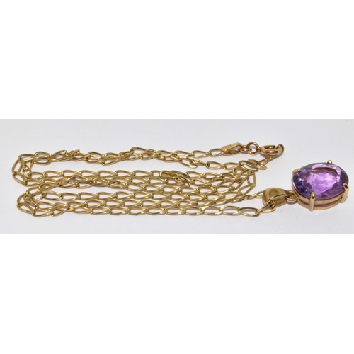 314 - 9ct gold pendant necklace set with large Amethyst stone chain 48cm