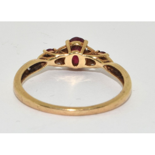 338 - 9ct gold ladies Ruby and Diamond H/M as diamond in the ring size Q