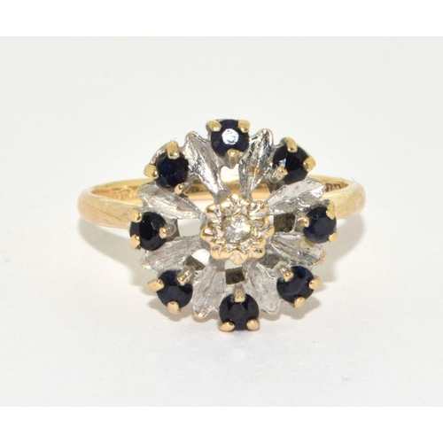 360 - 9ct gold ladies Diamond and sapphire open cluster ring size L