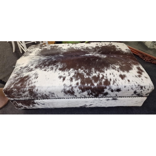 578 - Large Cow hide window stool 37x110x65cm standing on stub legs