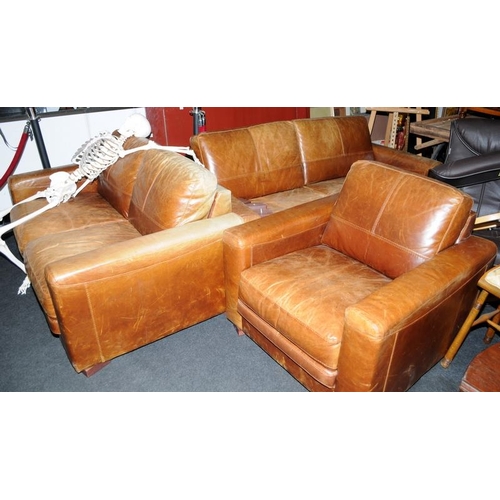 550 - 3 piece distressed brown leather suite comprising a 3 seat settee, 2 seat settee together with a sin... 