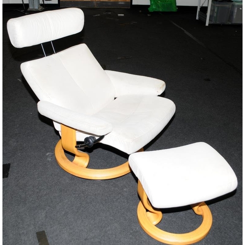 553 - Ekornes Stressless chair and foot stool this is linen material covered in need of a clean