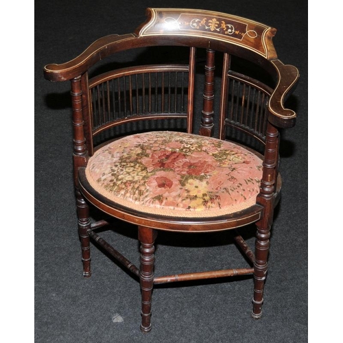 554 - Mahogany inlaid corner chair set with light decoration and standing on turned supports and spindle b... 