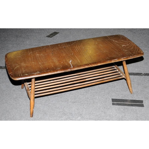 570 - Ercol dark oblong elm coffee table with under magazine tray