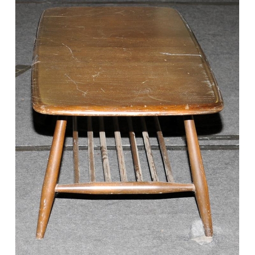 570 - Ercol dark oblong elm coffee table with under magazine tray