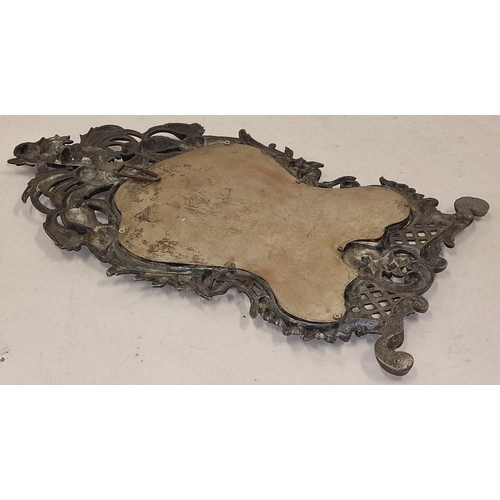 216 - Cast metal mirror in the Rocco style with bevelled edge glass 45x25cm