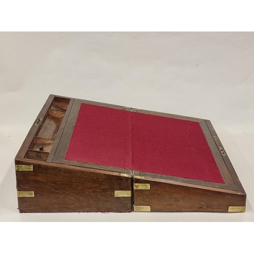 144 - Large mahogany campaign writing slope having brass fitments and fitted  inside