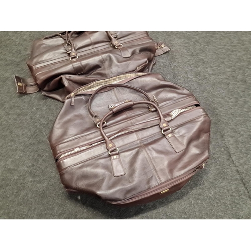 117 - Pair leather Steamer/ weekend bags by 