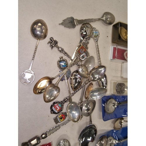 548 - Collection of Tourism spoons to include silver and a silver bookmark