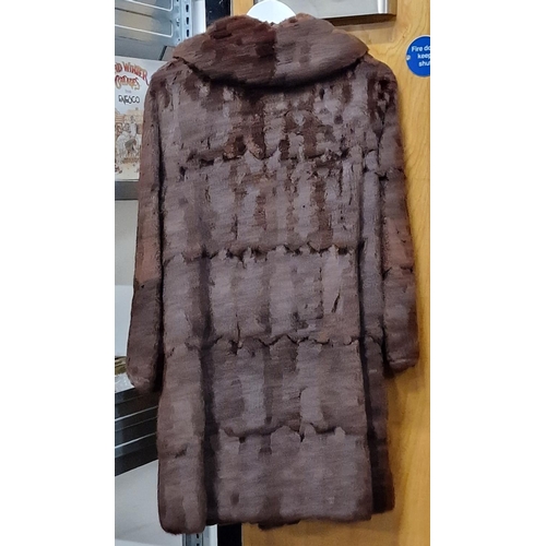 122 - Ladies brown 3/4 length fur coat size 10