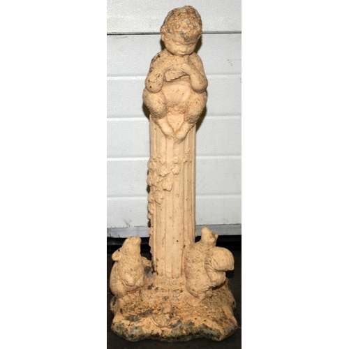 238 - Garden statue depicting a Faun sat on a column 85cm