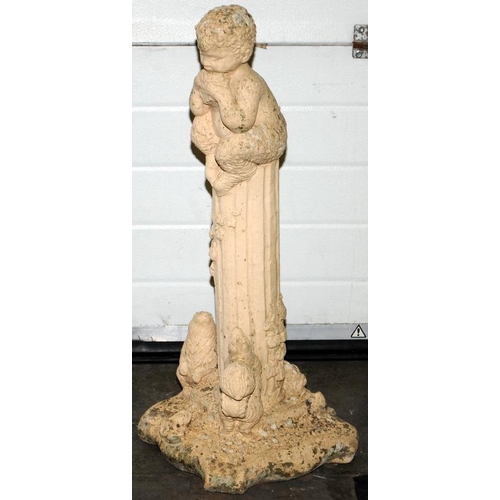 238 - Garden statue depicting a Faun sat on a column 85cm