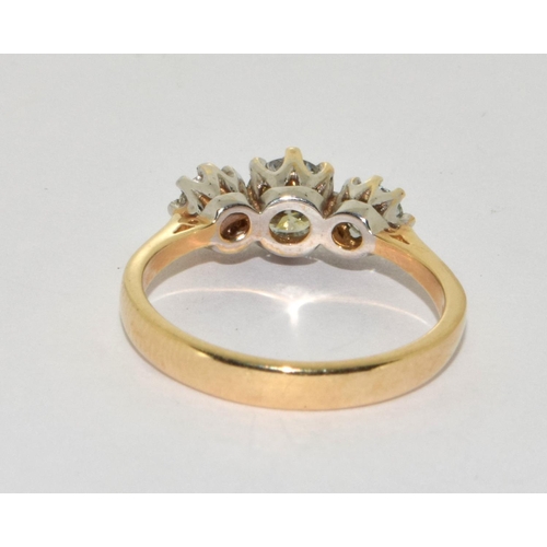 191 - 9ct gold ladies triple stone ring size P